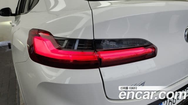 BMW X4 2023 — Photo 22/36