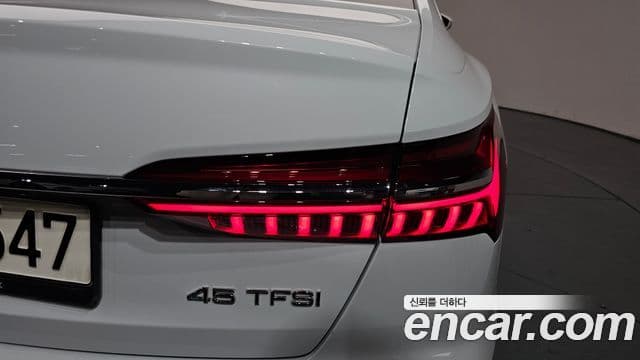 Audi A6 2021 — ფოტო 22/34