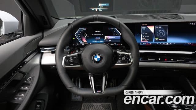 BMW 5 Series 2024 — ფოტო 14/20