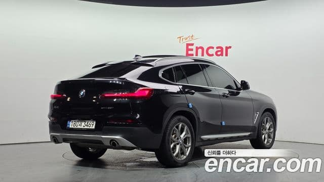 BMW X4 2021 — Фото 2/20