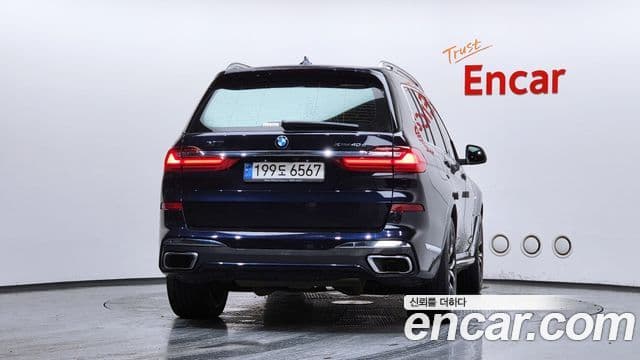 BMW X7 2022 — ფოტო 4/20