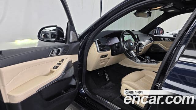 BMW X5 2021 — ფოტო 10/20