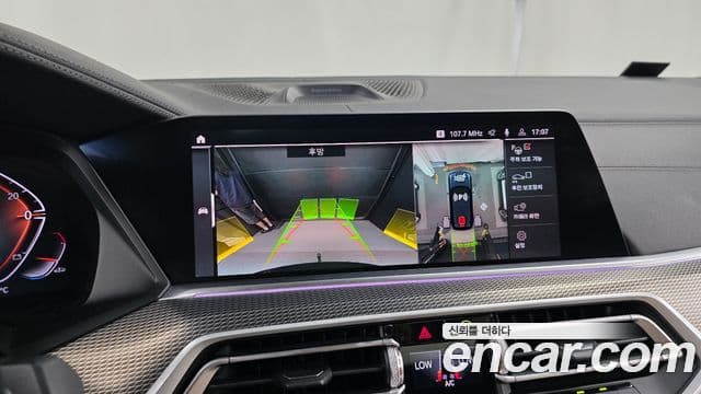 BMW X5 2021 — ფოტო 15/20