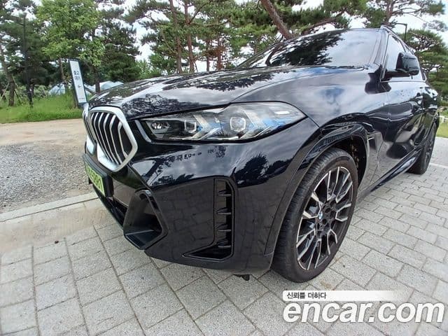 BMW X6 2025 — ფოტო 8/14