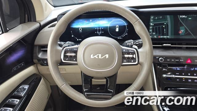 Kia Carnival 2023 — ფოტო 14/20