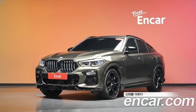 BMW X6 2021 — Фото 1/20