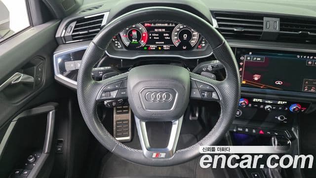 Audi Q3 2022 — ფოტო 17/33