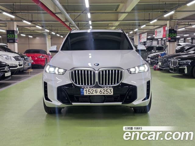 BMW X5 2024 — ფოტო 16/20