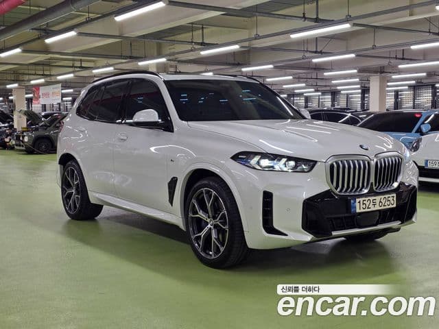 BMW X5 2024 — ფოტო 15/20