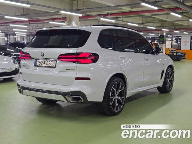 BMW X5 2024 — ფოტო 8/20