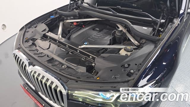 BMW X7 2021 — ფოტო 6/20