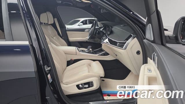 BMW X7 2021 — ფოტო 10/20
