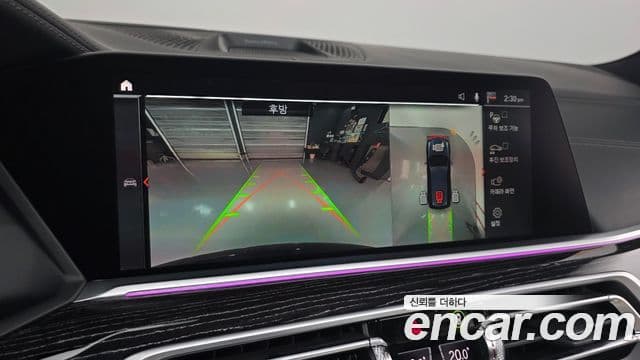BMW X7 2021 — ფოტო 15/20
