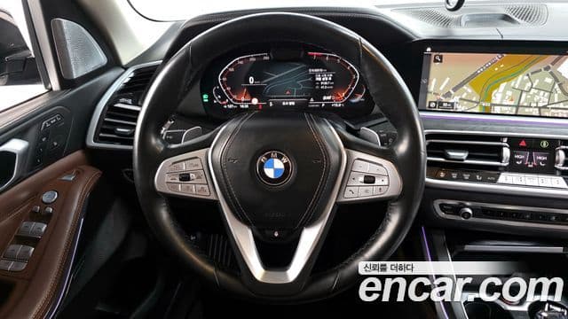 BMW X7 2021 — ფოტო 13/20