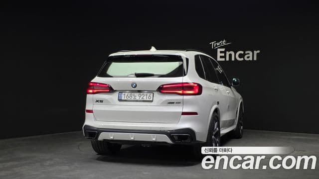 BMW X5 2023 — ფოტო 4/20
