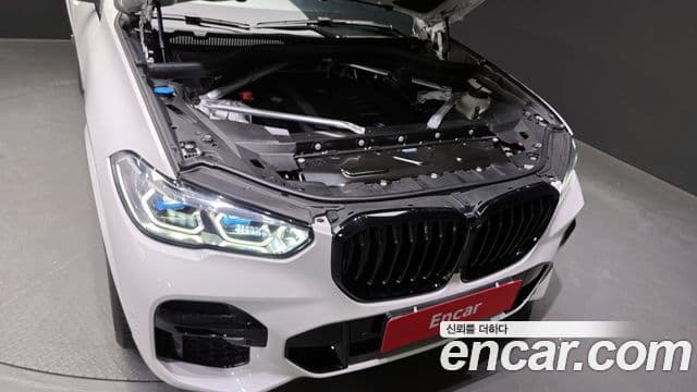 BMW X5 2023 — ფოტო 6/20