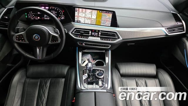 BMW X5 2023 — ფოტო 7/20