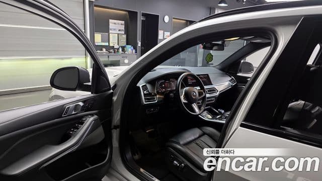 BMW X5 2023 — ფოტო 10/20