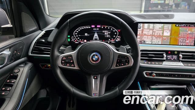 BMW X5 2023 — ფოტო 13/20