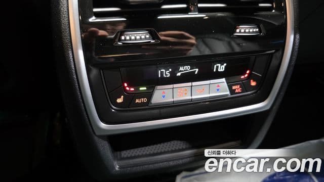BMW X5 2023 — ფოტო 18/20