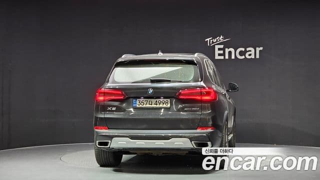 BMW X5 2021 — ფოტო 4/20