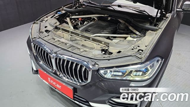 BMW X5 2021 — ფოტო 6/20