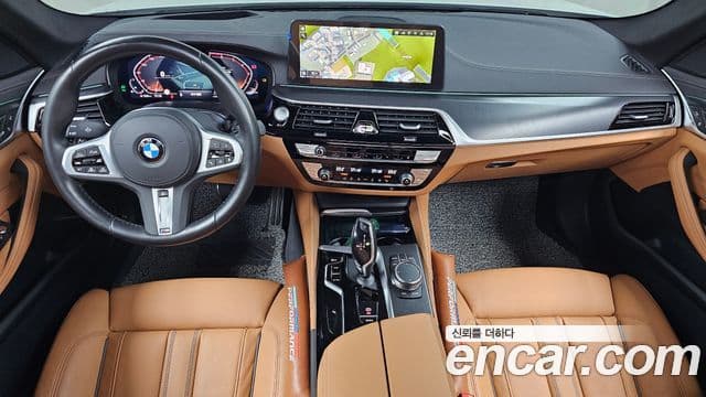 BMW 5 Series 2023 — фото 6 из 20