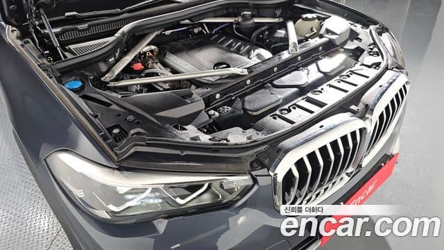 BMW X5 2022 — ფოტო 6/20