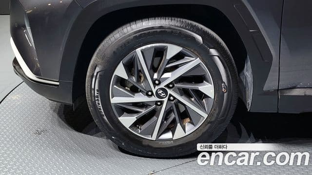 Hyundai Tucson Hybrid 2021 — ფოტო 18/20