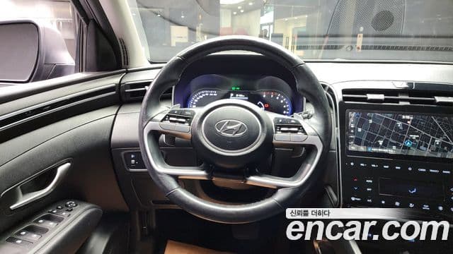 Hyundai Tucson Hybrid 2021 — ფოტო 17/20