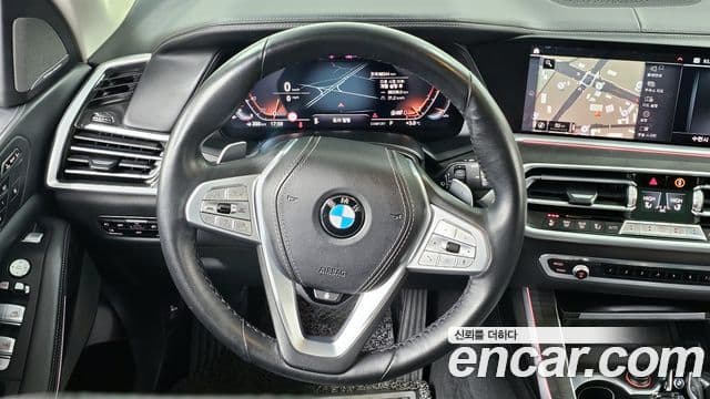 BMW X7 2021 — ფოტო 13/20