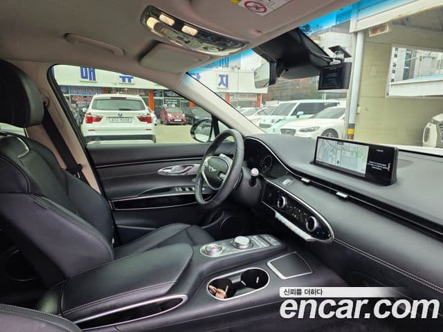 Genesis GV70 2021 — ფოტო 15/16