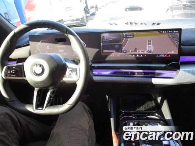 BMW 5 Series 2024 — ფოტო 14/20