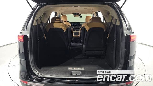 Kia Carnival 2021 — ფოტო 19/20