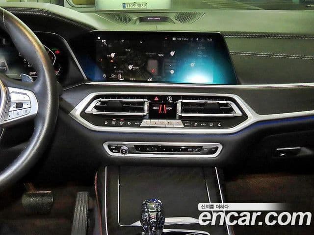 BMW X7 2021 — ფოტო 10/20
