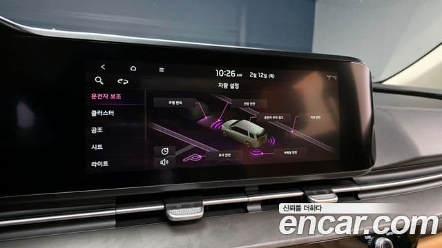 Kia Carnival 2021 — ფოტო 16/20