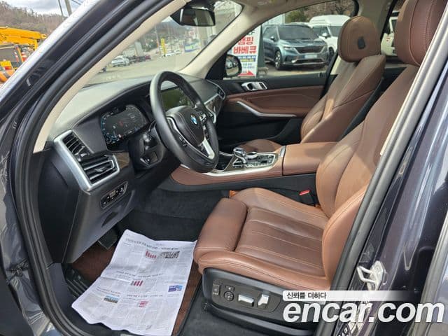 BMW X5 2022 — ფოტო 13/20