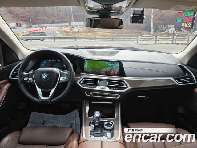 BMW X5 2022 — ფოტო 15/20