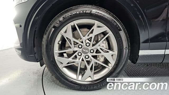 Genesis GV70 2023 — ფოტო 15/20