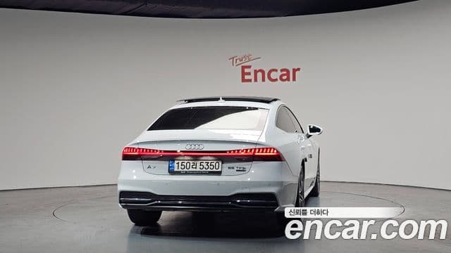 Audi A7 2021 — ფოტო 4/20