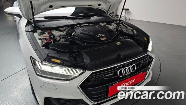 Audi A7 2021 — ფოტო 6/20