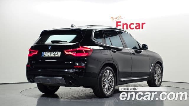 BMW X3 2021 — ფოტო 1/20