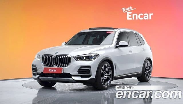BMW X5 2022 — Фото 1/20