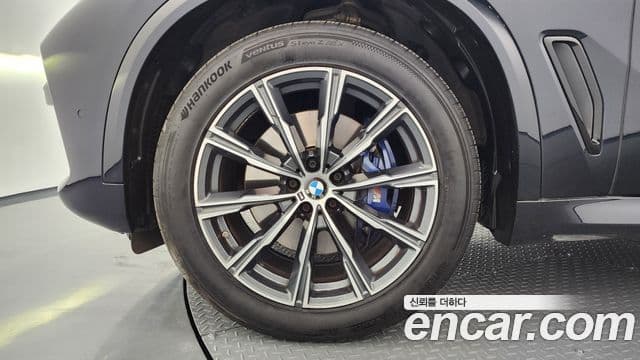 BMW X5 2021 — ფოტო 11/20