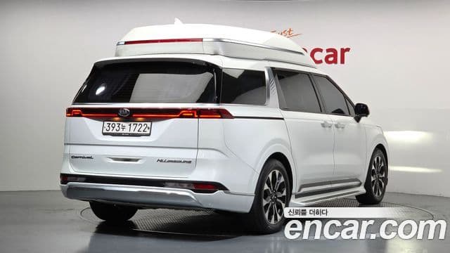 Kia Carnival 2021 — ფოტო 1/20
