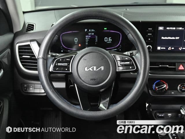 Kia Seltos 2023 — ფოტო 13/20