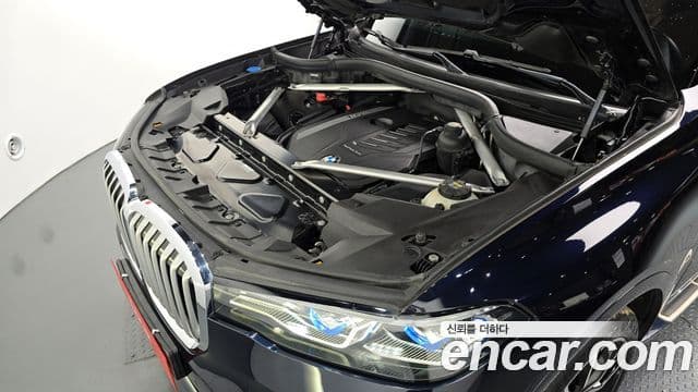 BMW X7 2021 — ფოტო 6/20