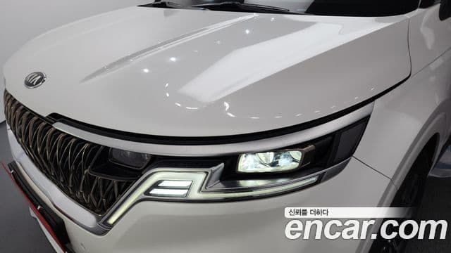Kia Carnival 2021 — ფოტო 16/35