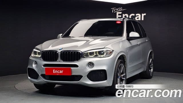 BMW X5 2018 — Фото 1/20