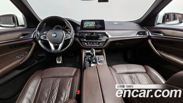 BMW 5 Series 2018 — Фото 7/20